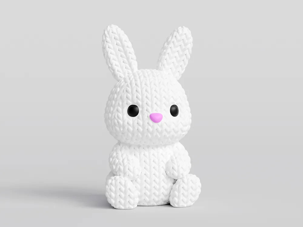 White coloured knitted textured 3D printed Bunny figure/ key tag on a white background facing forward