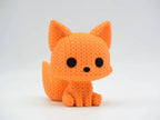Orange knitted textured 3D printed Fox figure/ key tag on a white background