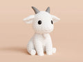 White knitted textured 3D printed Goat figure/ key tag on a light orange background