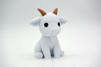 White knitted textured 3D printed Goat figure/ key tag on a white background