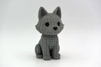 Grey knitted textured 3D printed Wolf figure/ key tag on a white background